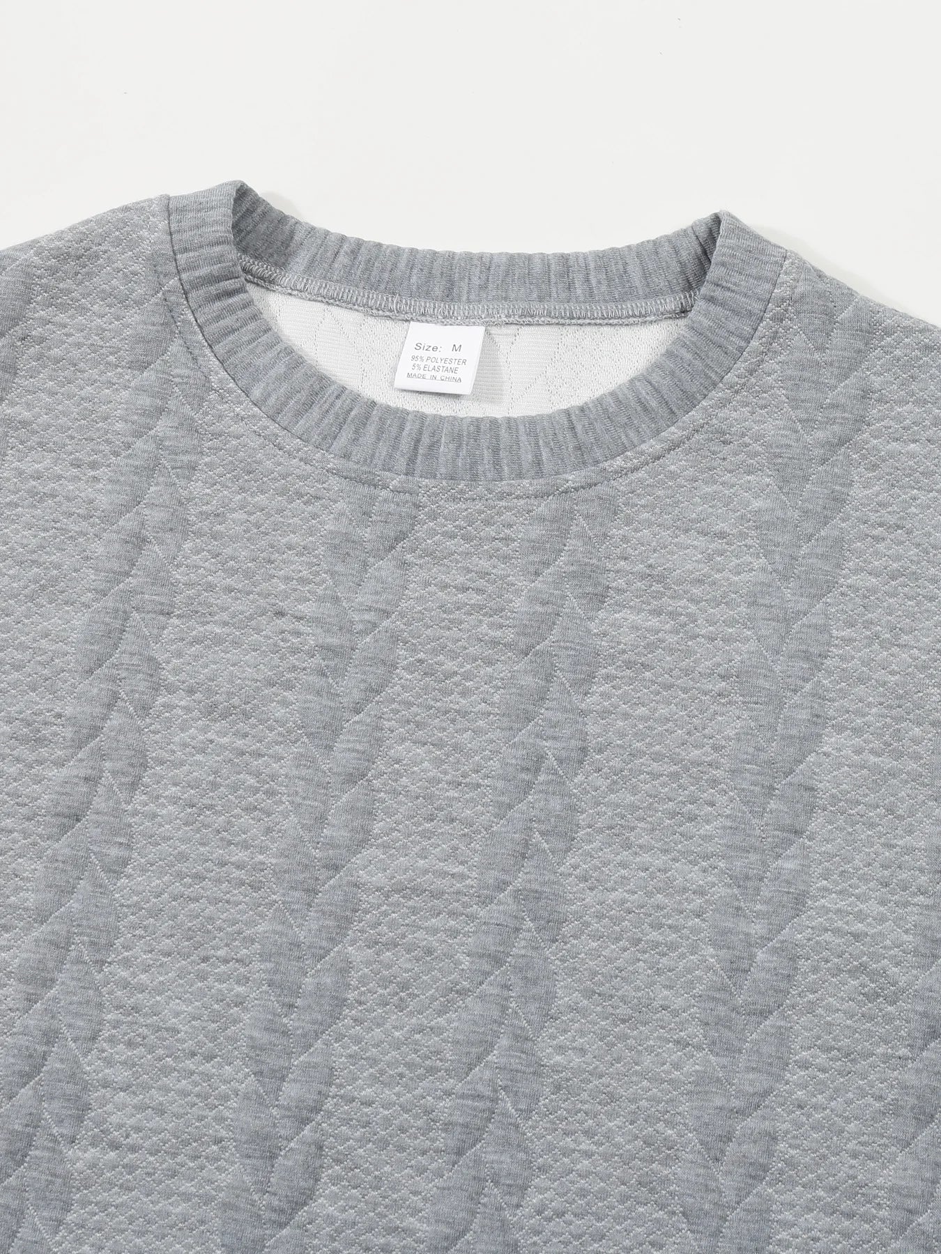 Autumn men's new round neck jacquard checkered high-end